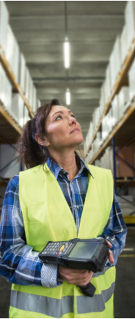 woman in warehouse using scanner